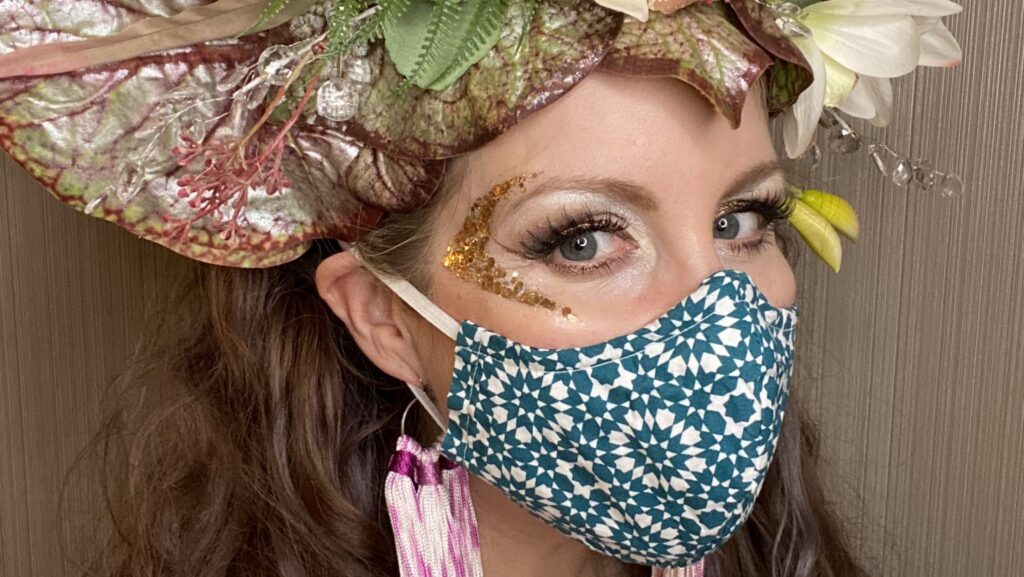 Danielle Smith Wearing Mask and Elektra Cosmetics Face Glitters