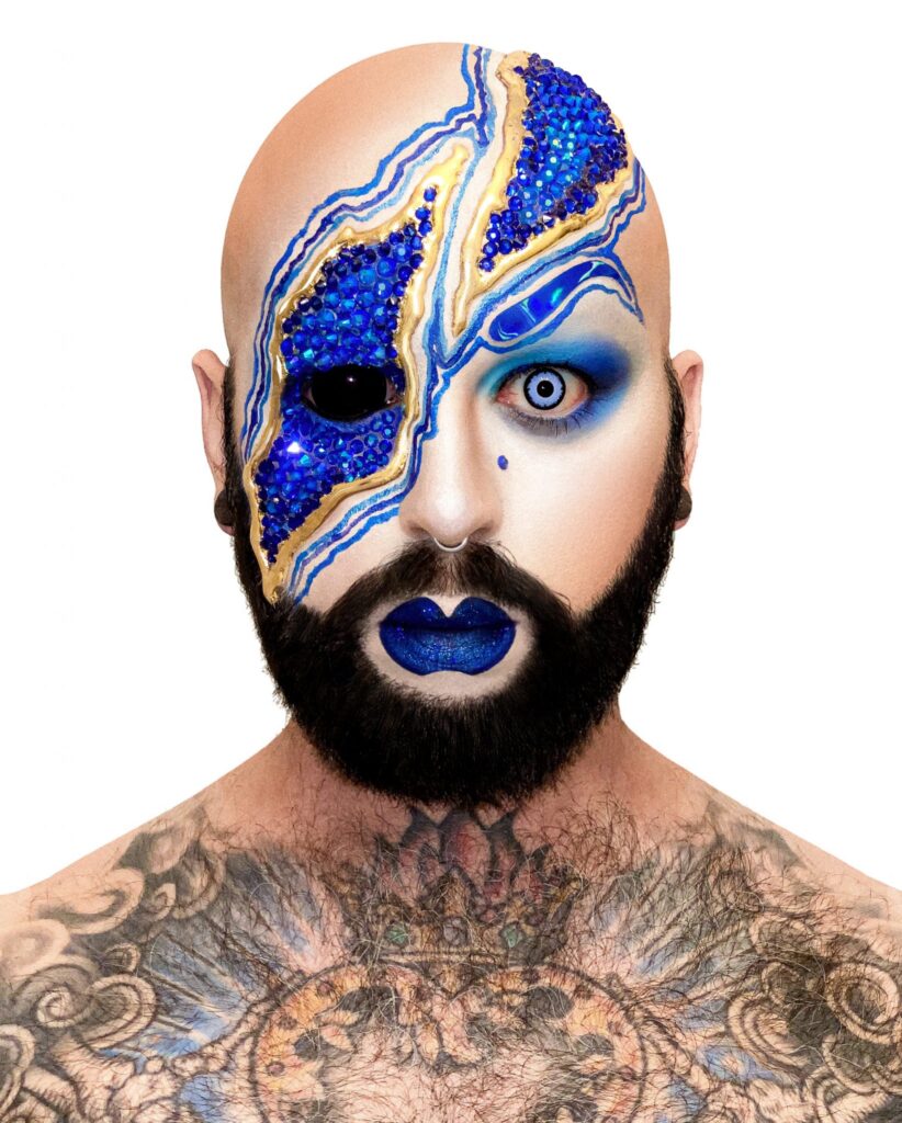 Apostrophe wearing Elektra Cosmetics Blue Creative Capsule