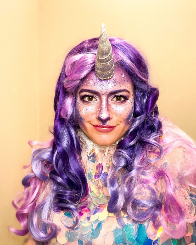 Caroline Rosa Wearing Elektra Cosmetics Purple Creative Capsule