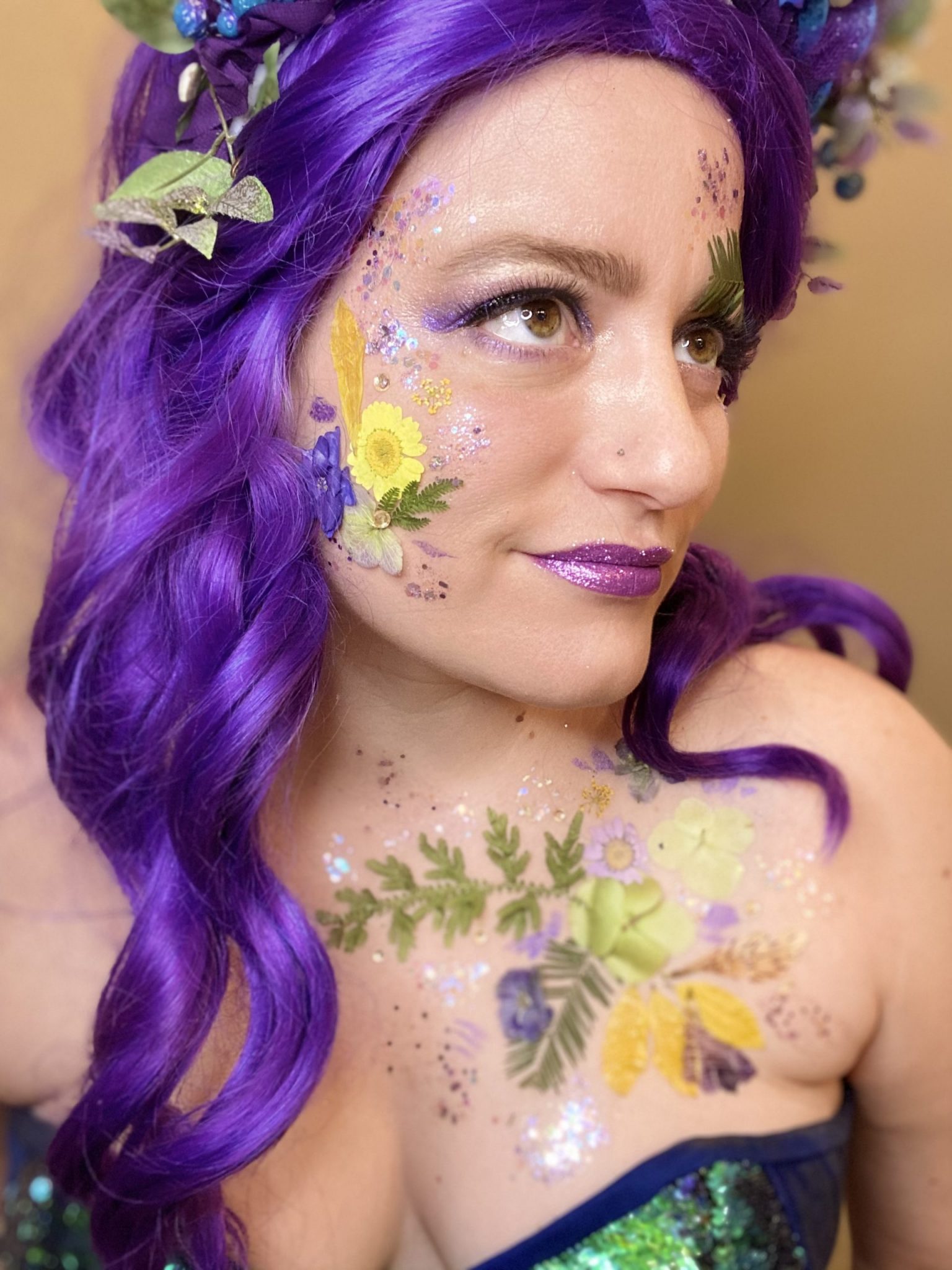 Creative makeup look with purple tones