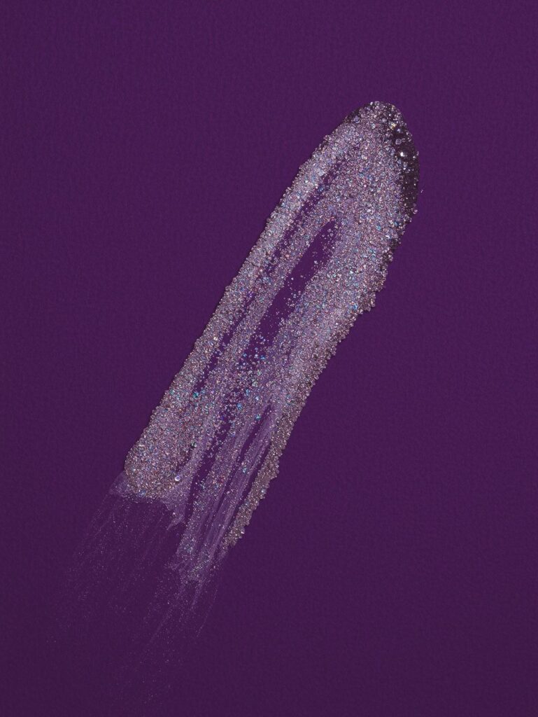 UV blacklight body glitter makeup - Elektra Cosmetics